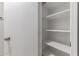 Bright white utility closet featuring shelving at 1753 E Pinto Dr, Gilbert, AZ 85296