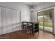 Dining area featuring sliding glass doors to backyard and closet space at 1753 E Pinto Dr, Gilbert, AZ 85296