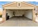 View of an attached two car garage with room for parking and storage at 1753 E Pinto Dr, Gilbert, AZ 85296