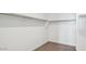 Walk in closet with carpeted floor and rods for hanging clothes at 1803 W Starfire Ave, Apache Junction, AZ 85120