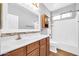 Well-lit bathroom featuring a shower-tub combination and classic vanity at 18033 W Carmen Dr, Surprise, AZ 85388