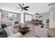 Decorated living room featuring lots of comfortable seating at 18033 W Carmen Dr, Surprise, AZ 85388