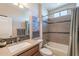 Well-lit bathroom with a shower-tub combo and modern vanity at 1804 E Amaranth Trl, Queen Creek, AZ 85140