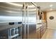 Kitchen featuring a stainless steel refrigerator and modern appliances at 1804 E Amaranth Trl, Queen Creek, AZ 85140