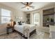 Cozy primary bedroom showcasing lots of natural light and recessed shelving at 1804 E Amaranth Trl, Queen Creek, AZ 85140