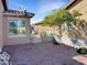 Low maintenance backyard features a rock ground covering and secure fenced area at 19765 N Swan Ct, Maricopa, AZ 85138