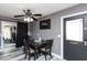 Cozy dining area featuring a modern table set, stylish lighting, and an inviting atmosphere at 2061 E Bayberry Ave, Mesa, AZ 85204