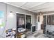 Bright living room with sliding glass doors, neutral walls, and ample space for entertaining at 2061 E Bayberry Ave, Mesa, AZ 85204