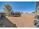 Spacious backyard featuring gravel landscaping and a trampoline at 214 N 190Th Dr, Buckeye, AZ 85326