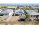 Aerial view of a fenced backyard featuring desert landscaping, a trampoline, and a covered patio area at 214 N 190Th Dr, Buckeye, AZ 85326