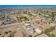 An aerial view shows the property, equestrian facilities, and surrounding neighborhood at 22005 N 86Th Ave, Peoria, AZ 85383