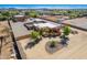 Aerial view showcases the property, horse facilities, landscaping, and surrounding area at 22005 N 86Th Ave, Peoria, AZ 85383