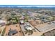 Expansive aerial view showing the property, the neighborhood and distant mountains at 22005 N 86Th Ave, Peoria, AZ 85383