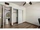 Bedroom featuring an open closet and neutral walls at 22005 N 86Th Ave, Peoria, AZ 85383