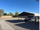 Expansive driveway and parking area with covered carport, ready for all your vehicles at 22005 N 86Th Ave, Peoria, AZ 85383