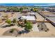 Expansive aerial view of front exterior landscaping and horse facilities at 22005 N 86Th Ave, Peoria, AZ 85383