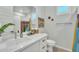 Bathroom featuring modern vanity, mirror, and a stylish shower curtain for a fresh aesthetic at 2205 E Fallen Leaf Ln, Phoenix, AZ 85024