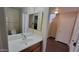 Bathroom with a modern sink, mirror, and adjacent toilet at 22067 W Cantilever St, Buckeye, AZ 85326