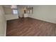 Open upstairs living area with wood-look floors, filled with natural light, and ready for relaxation at 22067 W Cantilever St, Buckeye, AZ 85326