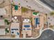 High-angle shot of homes with solar panels, landscaped yards, and well-paved streets in a residential community at 25320 W Heathermoor Dr, Buckeye, AZ 85326