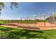 Well-maintained baseball field with chain-link fencing and wood bleachers, perfect for outdoor sports at 26716 W Ponderosa Ln, Buckeye, AZ 85396