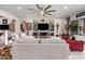 Spacious living room featuring modern decor and recessed lighting at 26716 W Ponderosa Ln, Buckeye, AZ 85396