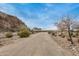 Dirt road leading to property at 26868 N 104Th Ln, Peoria, AZ 85383