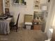 Small office or study space with table, chair, art and décor at 306 S Recker Rd # 212, Mesa, AZ 85206