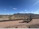 Backyard with seating, gravel, and a view of the mountains at 3301 S Goldfield Rd # 4025, Apache Junction, AZ 85119