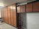 Well-organized garage with custom cabinets and ample storage at 3301 S Goldfield Rd # 4025, Apache Junction, AZ 85119