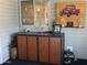 Cozy outdoor cabinet in the sun room at 3301 S Goldfield Rd # 4025, Apache Junction, AZ 85119