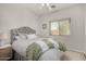 Cozy bedroom showcasing a plush bed and soft, natural light at 3431 E Canary Ct, Chandler, AZ 85286