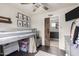 This bedroom includes a loft bed and a sliding barn door at 3603 S Weaver E Cir, Gilbert, AZ 85297