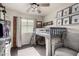 This bedroom includes a loft bed and a ceiling fan at 3603 S Weaver E Cir, Gilbert, AZ 85297