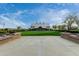 Beautiful exterior view of the clubhouse with nice landscaping on a sunny day at 3603 S Weaver Cir, Gilbert, AZ 85297