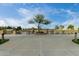 Seating area by the community lake and walking path is well landscaped at 3603 S Weaver Cir, Gilbert, AZ 85297