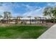 Community Pool area featuring shade sails, seating, and a view of the pool at 3603 S Weaver E Cir, Gilbert, AZ 85297