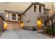 Inviting two-story home showcasing a well-maintained yard, a spacious driveway, and unique architectural details at 3603 S Weaver E Cir, Gilbert, AZ 85297