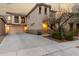 Beautiful two-story home showcasing a large driveway, neutral stucco, and unique architectural details at 3603 S Weaver Cir, Gilbert, AZ 85297