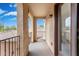 This is an exterior patio with textured walls, a railing, and a partially covered area at 3603 S Weaver E Cir, Gilbert, AZ 85297