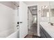 Bathroom featuring a shower-tub combo with great light, modern fixtures, and vanity at 36076 N Vidlak Dr, San Tan Valley, AZ 85143