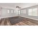 Bonus room featuring wood-look flooring, recessed lighting, ceiling fan, and abundant natural light at 36076 N Vidlak Dr, San Tan Valley, AZ 85143