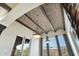 Unique ceiling showcasing a brick design, dark beams, decorative lighting, and desert views at 36430 N 34Th Ave, Phoenix, AZ 85086