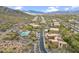 Desert community featuring neighborhood pool, set against a rugged mountain backdrop, with native vegetation at 36600 N Cave Creek Rd # D11, Cave Creek, AZ 85331