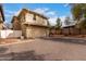 Exterior shot of a two-story home with an attached garage at 3819 E Jasper Dr, Gilbert, AZ 85296