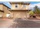 Two-story home with an attached garage and desert landscaping at 3819 E Jasper Dr, Gilbert, AZ 85296