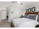 Bedroom displaying a decorative headboard, closet, and soothing color palette at 3921 E Runaway Bay Pl, Chandler, AZ 85249