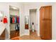 Bright bathroom featuring a walk-in closet, toilet and cabinet with beautiful tile flooring at 4138 E Indigo St, Gilbert, AZ 85298