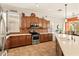 Beautiful kitchen with stainless steel appliances, tiled backsplash, and ample counter space for meal preparation at 4138 E Indigo St, Gilbert, AZ 85298