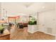 Inviting living room with an open floor plan, an aquarium, and a dining area, creating a great space for entertaining at 4138 E Indigo St, Gilbert, AZ 85298